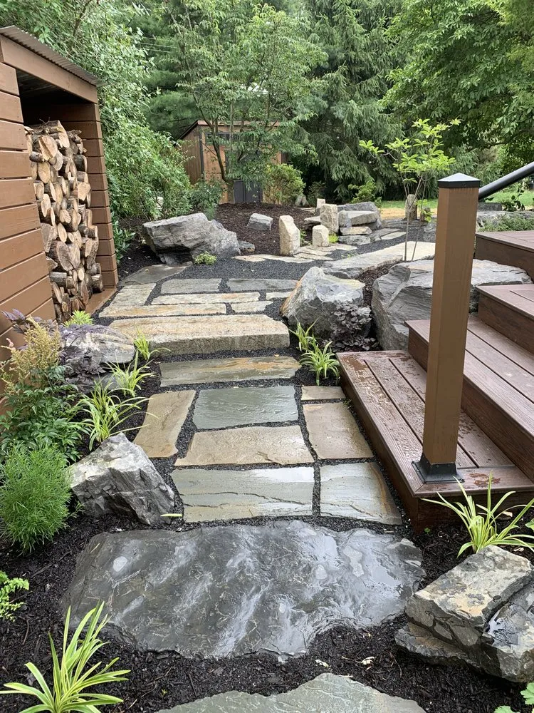 Expert yard maintenance for outdoor upgrades in Ambler, PA by Christopher A Zeek Landscape Design & Construction