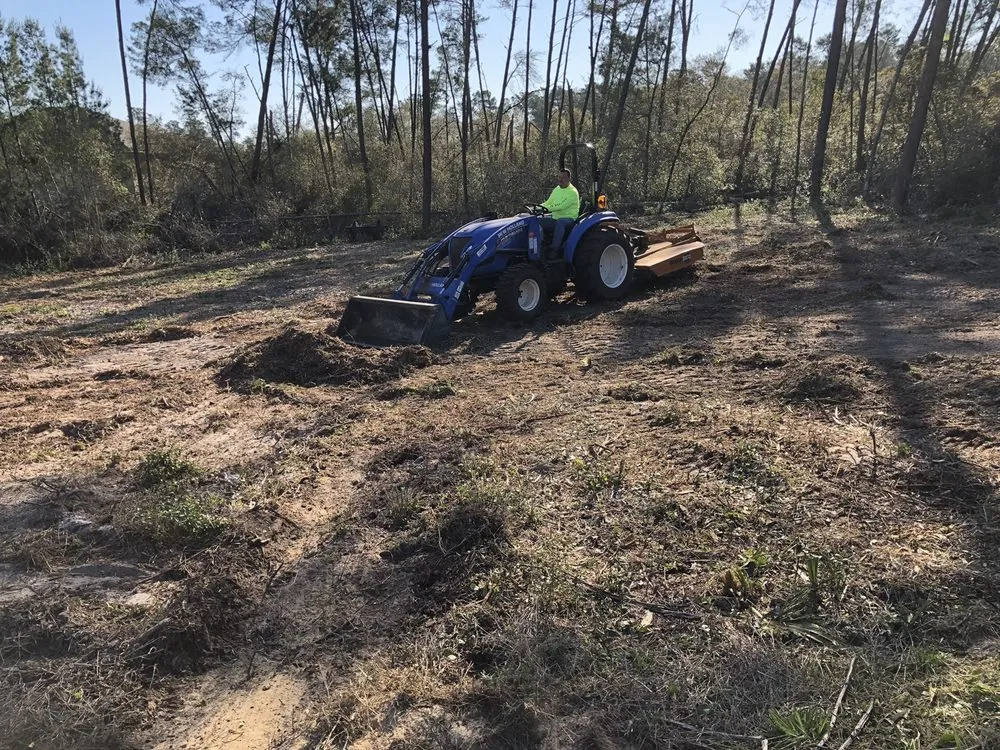 Professional landscape installation with custom design in Ocala, FL by Chuck and a Tractor Bush Hogging Service