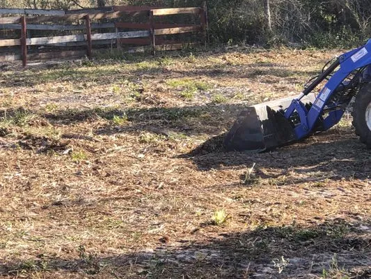 Chuck and a Tractor Bush Hogging Service Logo