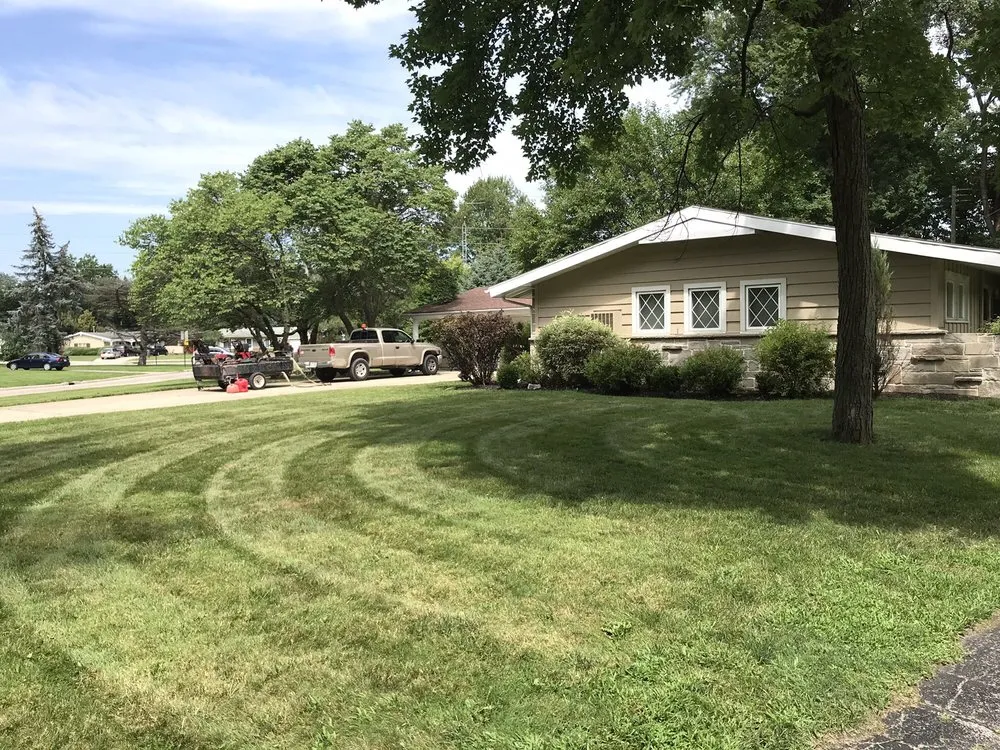 Custom landscape design for year-round maintenance in Rossford, OH by Citywide Lawn Care & Snow Removal