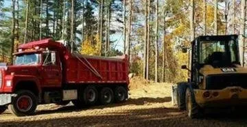 Custom yard cleanup service for year-round maintenance in Roseville, MI by C&J Bush Building and Landscaping