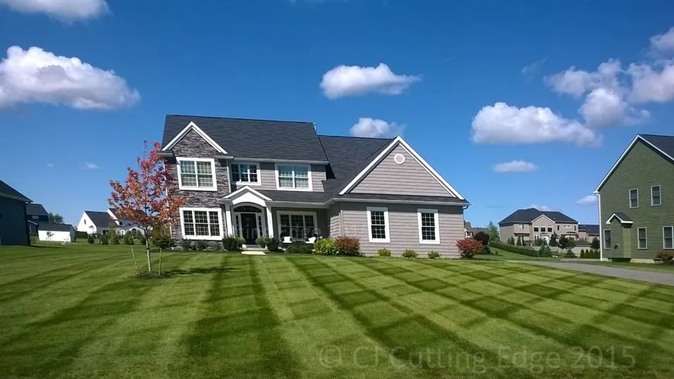 Trusted lawn care service with custom design in Tonawanda, NY by CJ Cutting Edge Lawn & Landscape