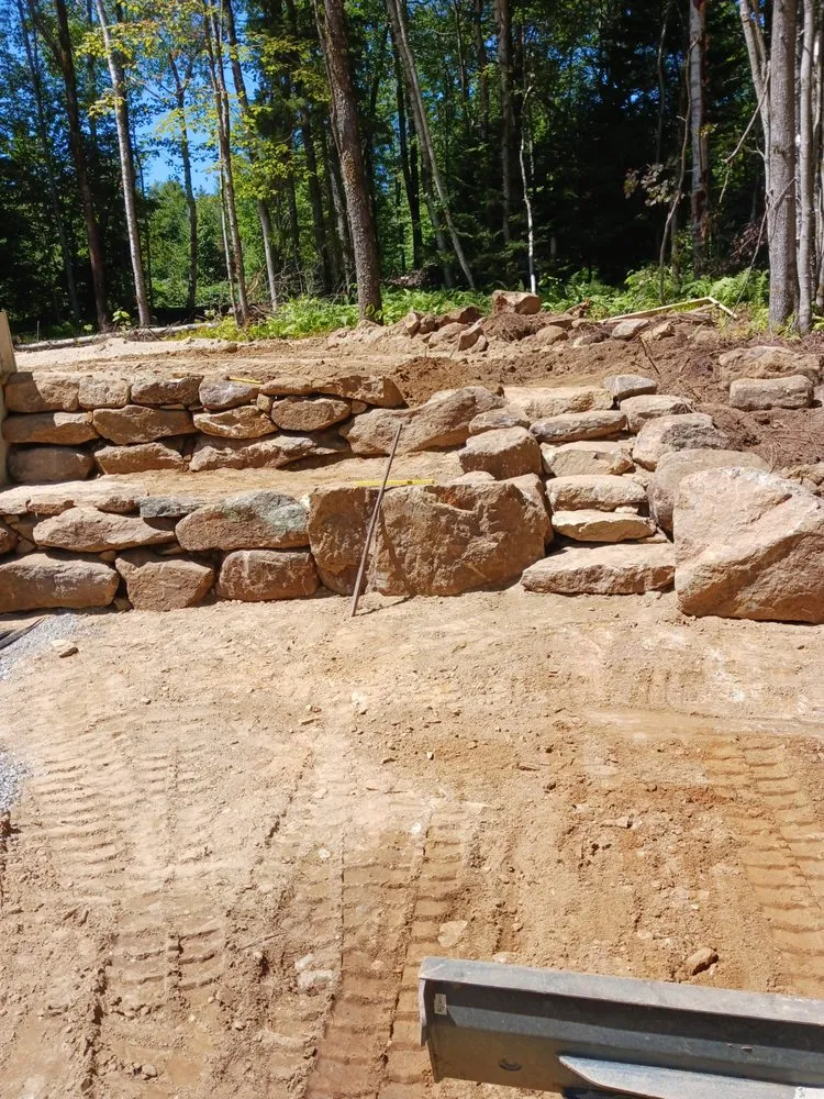 Affordable landscape installation with custom design in Antrim, NH by CJB Excavation and Hardscape