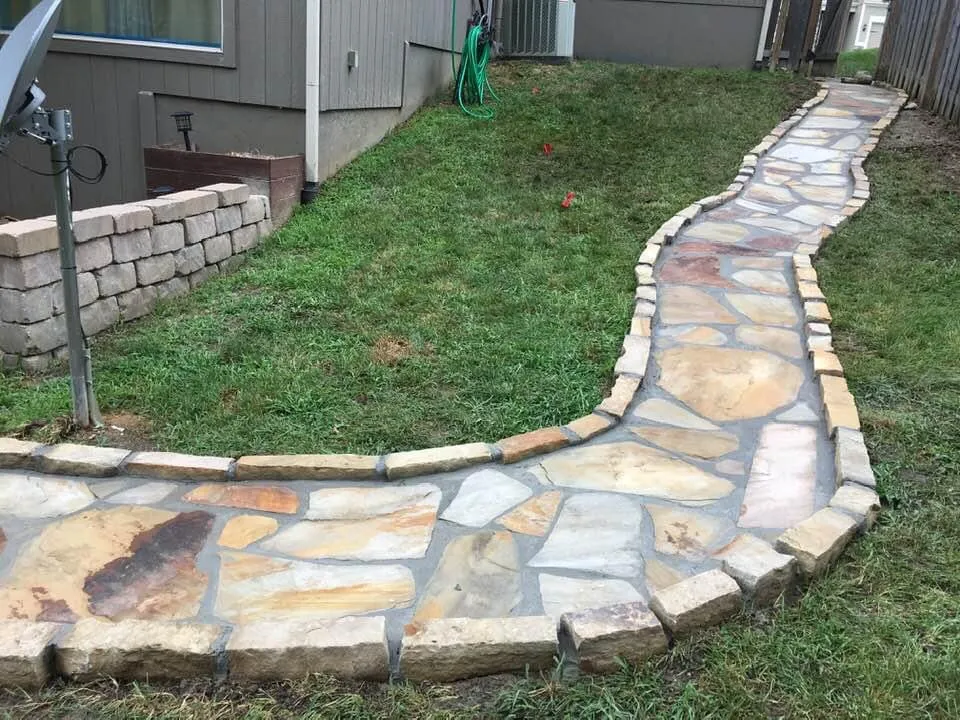 Affordable lawn mowing service for year-round maintenance in Kansas City, KS by CJS Landscape