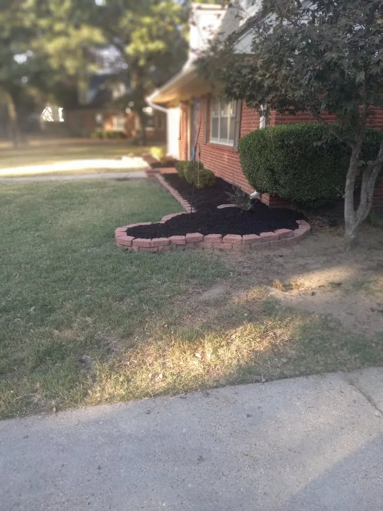 Custom landscape design in Blytheville, AR by Cjs Lawn Services