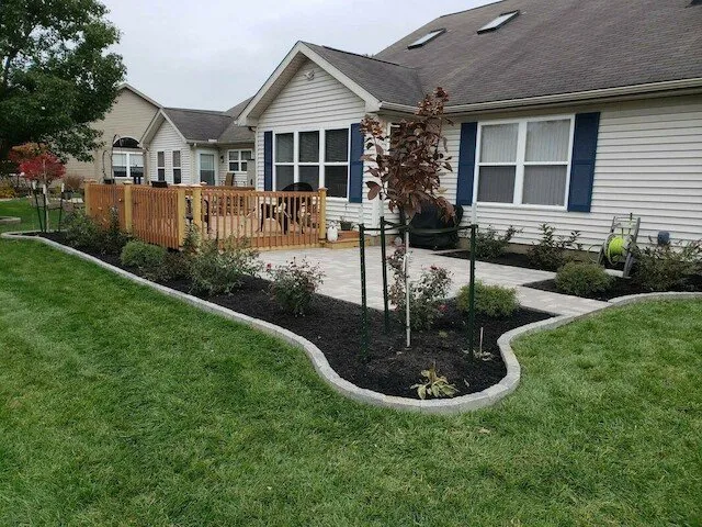 Professional outdoor landscaping with custom design in Remington, IN by Clark's Cutting Edge