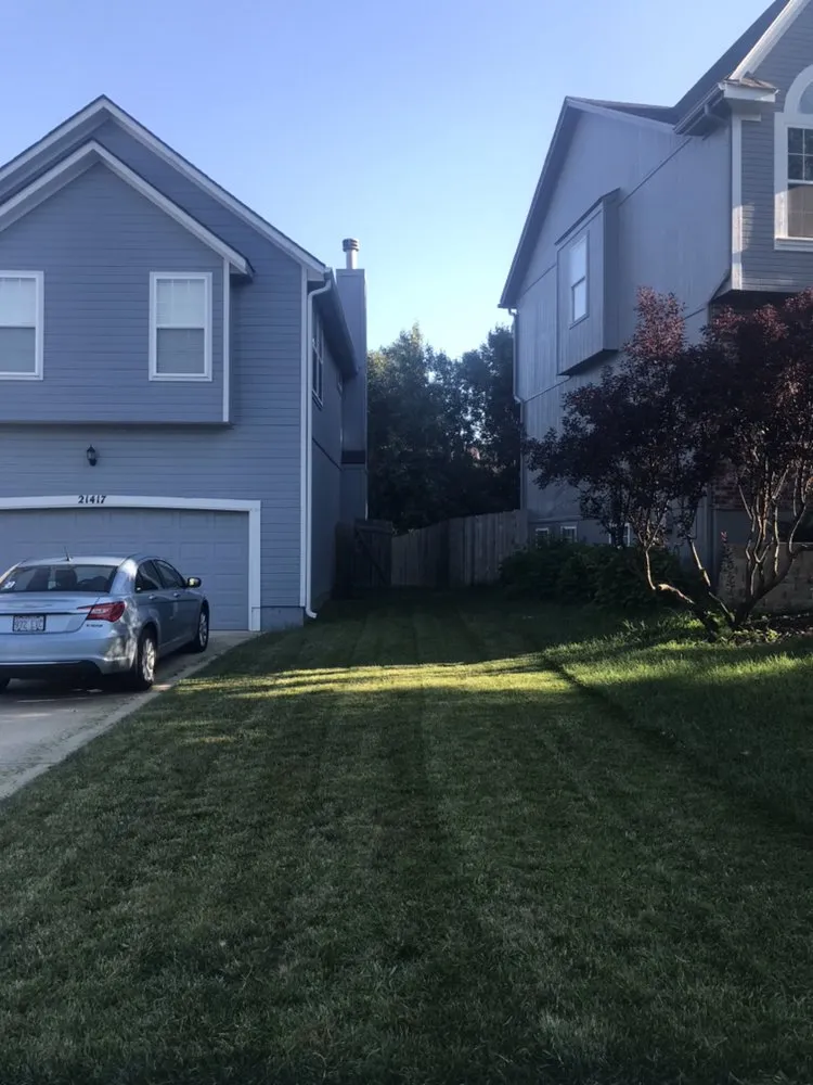 Affordable yard cleanup service for outdoor upgrades in Raytown, MO by Clark's Next Door Lawn Care