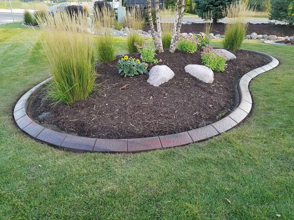 Local yard maintenance for beautiful yards across Utica, NY - Classic Cutz Landscaping & Custom Curbing