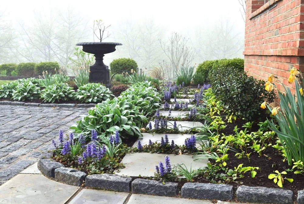 Expert lawn mowing service for residential properties in Kennett Square, PA by Classic Lawns & Gardens