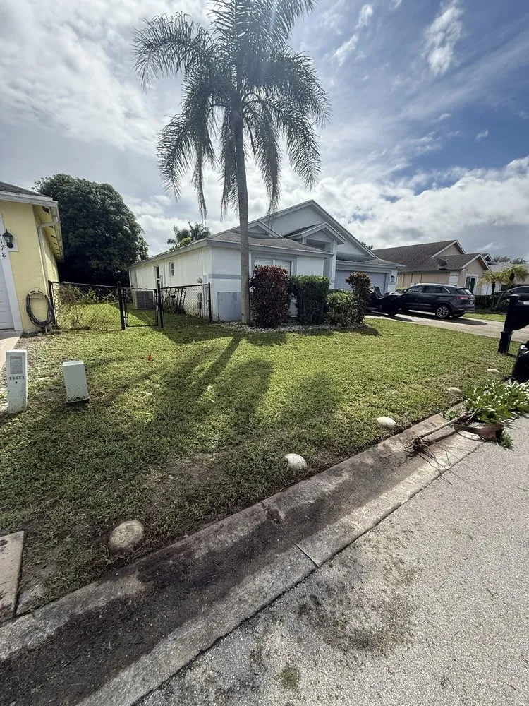 Custom garden landscaping for residential properties in Lake Worth Beach, FL by Classy Cuts Lawn Maintenance