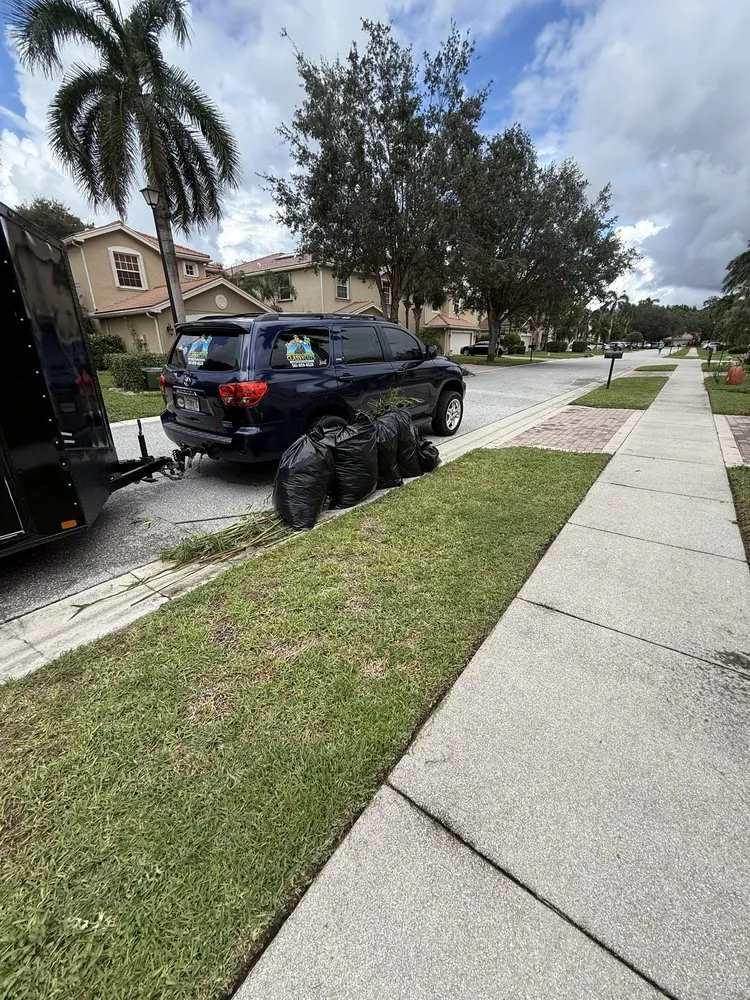 Expert lawn mowing service for year-round maintenance in Lake Worth Beach, FL by Classy Cuts Lawn Maintenance