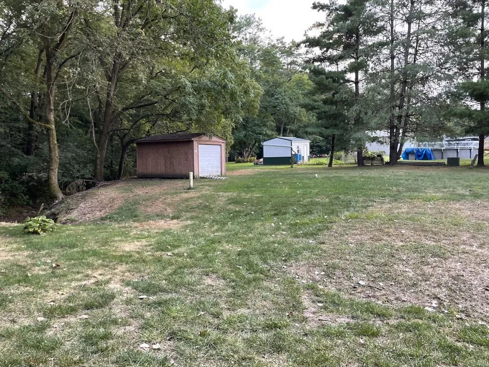 Custom lawn care service with custom design in Peoria, IL by Classy Grass