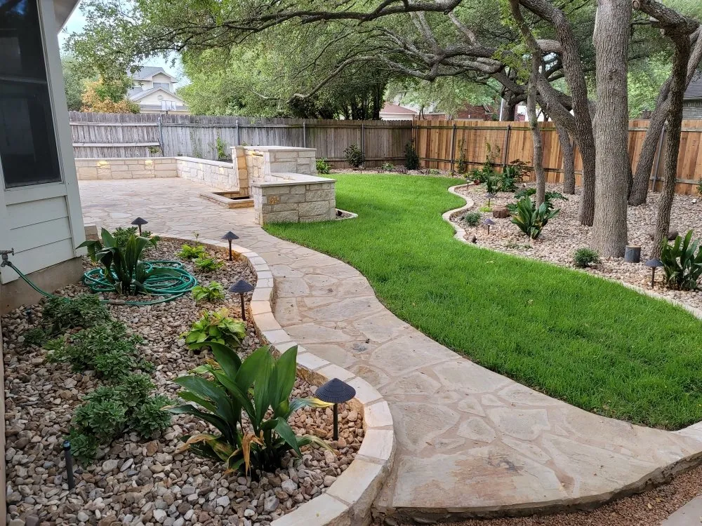Custom garden landscaping with custom design in Georgetown, TX by Clayman Outdoors