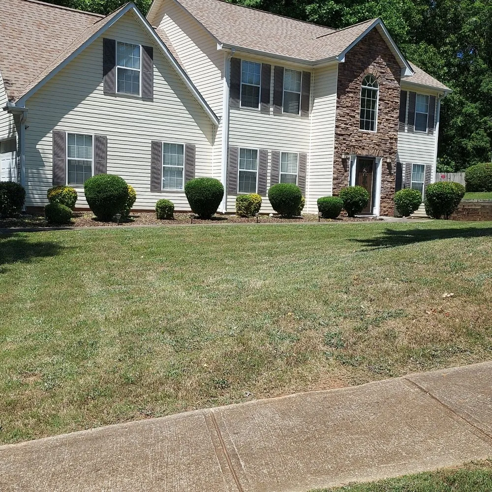 Custom landscape installation with custom design in Villa Rica, GA by Clayton Family Lawn Care