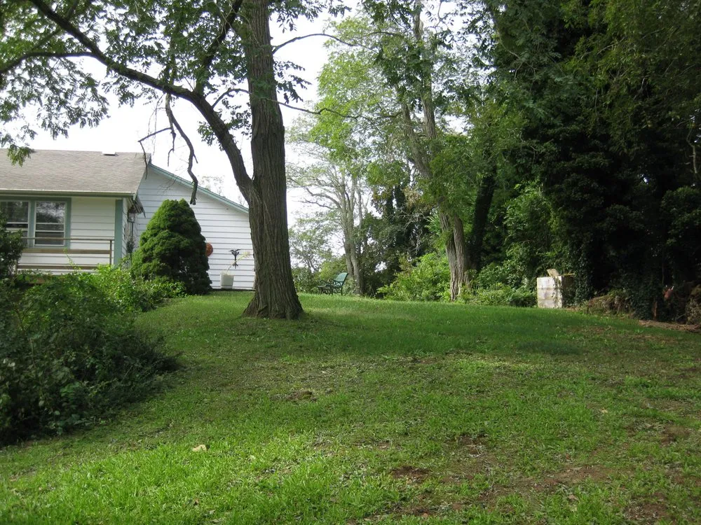 Professional landscape installation with custom design across West Dennis, MA - Clean & Green Property Management