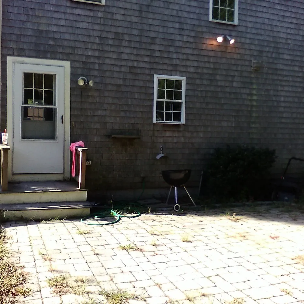 Custom yard cleanup service for homes in West Dennis, MA by Clean & Green Property Management