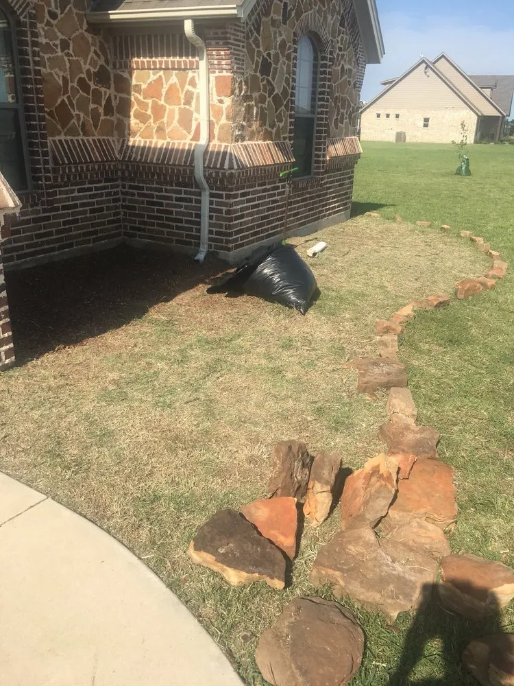 Professional yard maintenance with custom design in Justin, TX by Clean And Clear Lawn And Landscaping