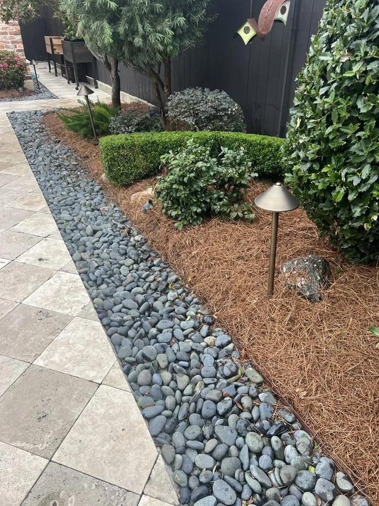 Custom landscape installation in Kenner, LA by Clean Cut Landscape Co.