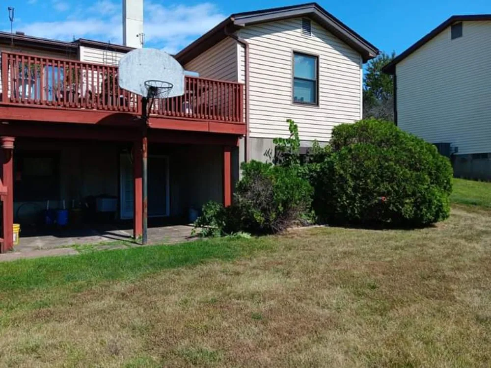 Professional yard maintenance with custom design in Saint Charles, MO by Clean Cut Landscaping and Tree Services