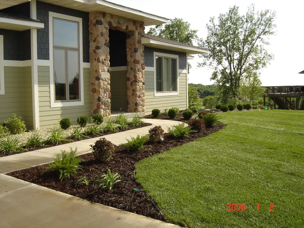 Reliable outdoor landscaping for residential properties in Brooklyn Park, MN by Clean Cut Lawn & Landscape
