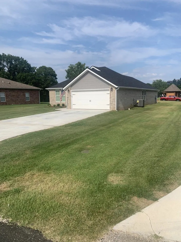 Local lawn care service with custom design in Cassville, MO by Clean Cut Lawn & Landscaping