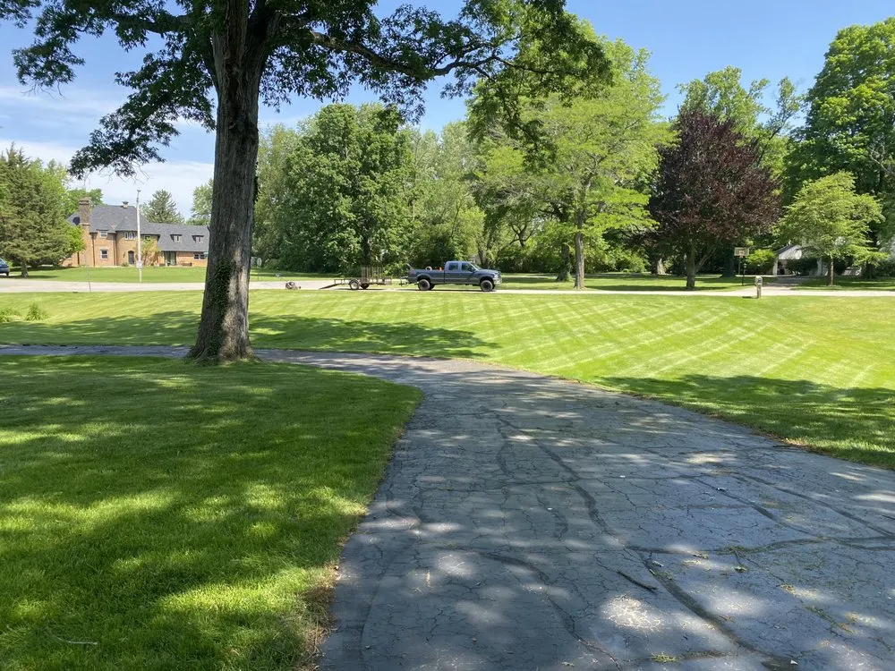 Affordable yard cleanup service for year-round maintenance in Country Club Heights, IN by Clean Cut Property Maintenance