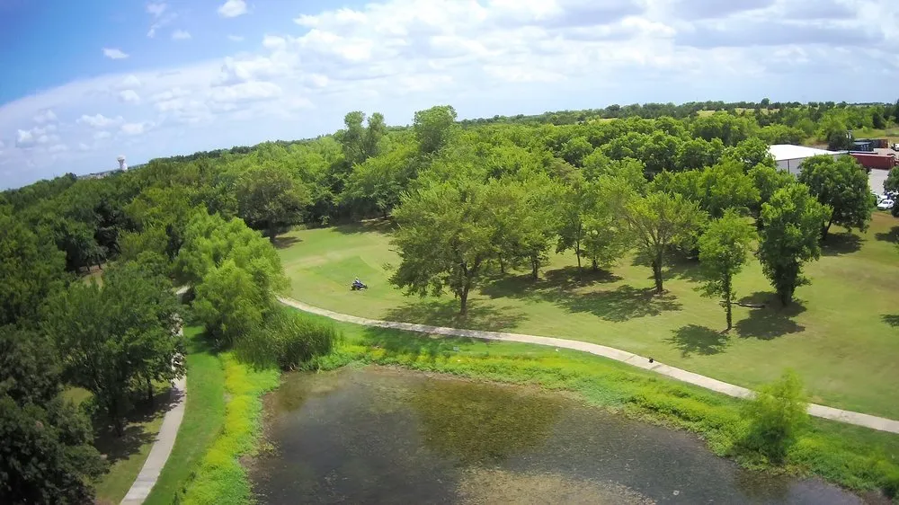 Expert yard maintenance for residential properties in Sherman, TX by Clean Cut Yard Services