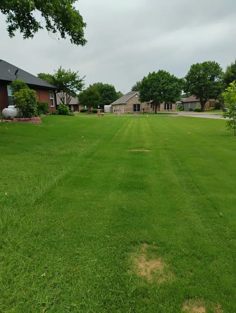Professional residential landscaping with custom design in Gainesville, TX by Clean Cuts Lawn Care Service