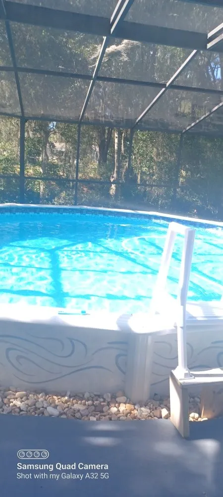 Professional lawn mowing service for residential properties in Lake Panasoffkee, FL by Cleaning By Alisha Olver