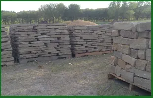 Custom outdoor landscaping with custom design in Aledo, TX by Clear Fork Materials