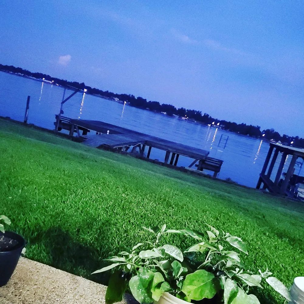 Custom outdoor landscaping with custom design in Denham Springs, LA by Clemons Lawn Care