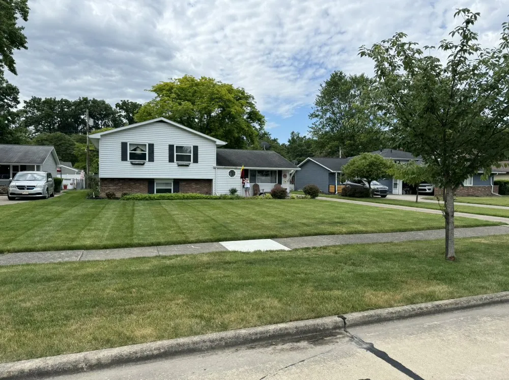 Custom residential landscaping for year-round maintenance in Fairview Park, OH by Cleveland Premier Liquidators