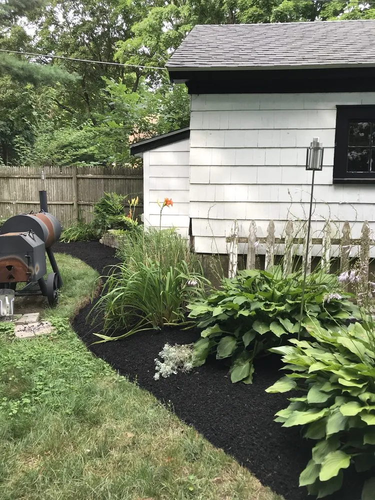 Affordable lawn mowing service in Foxborough, MA by Click Landscape