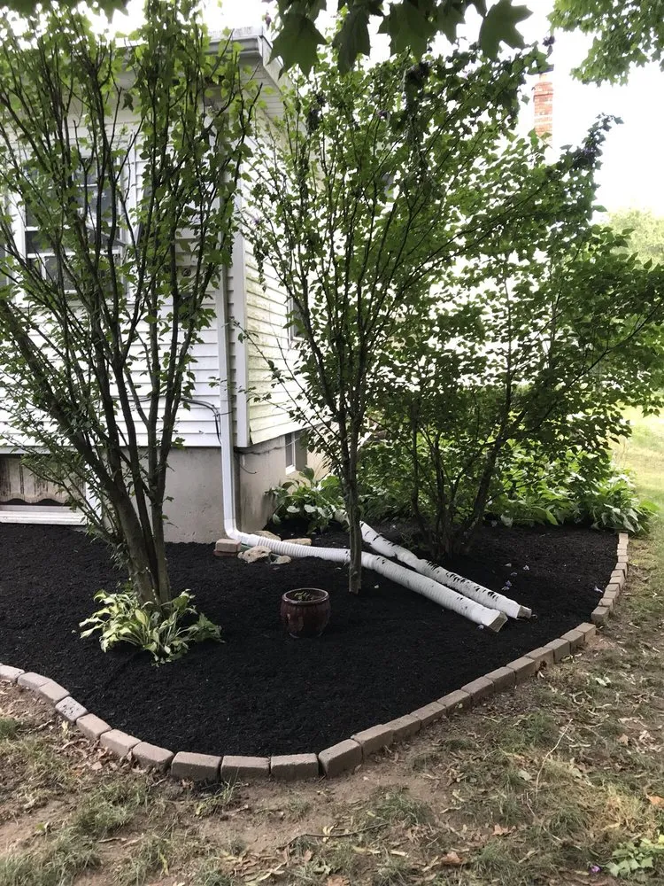 Custom residential landscaping for residential properties in Foxborough, MA by Click Landscape