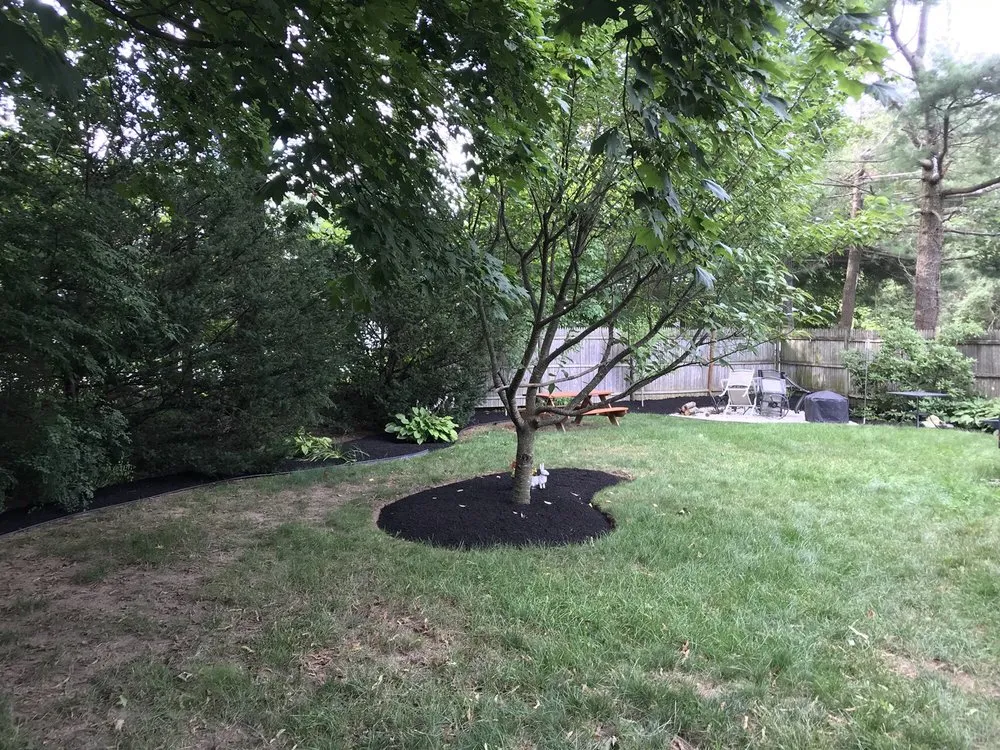 Custom landscape design in Foxborough, MA by Click Landscape