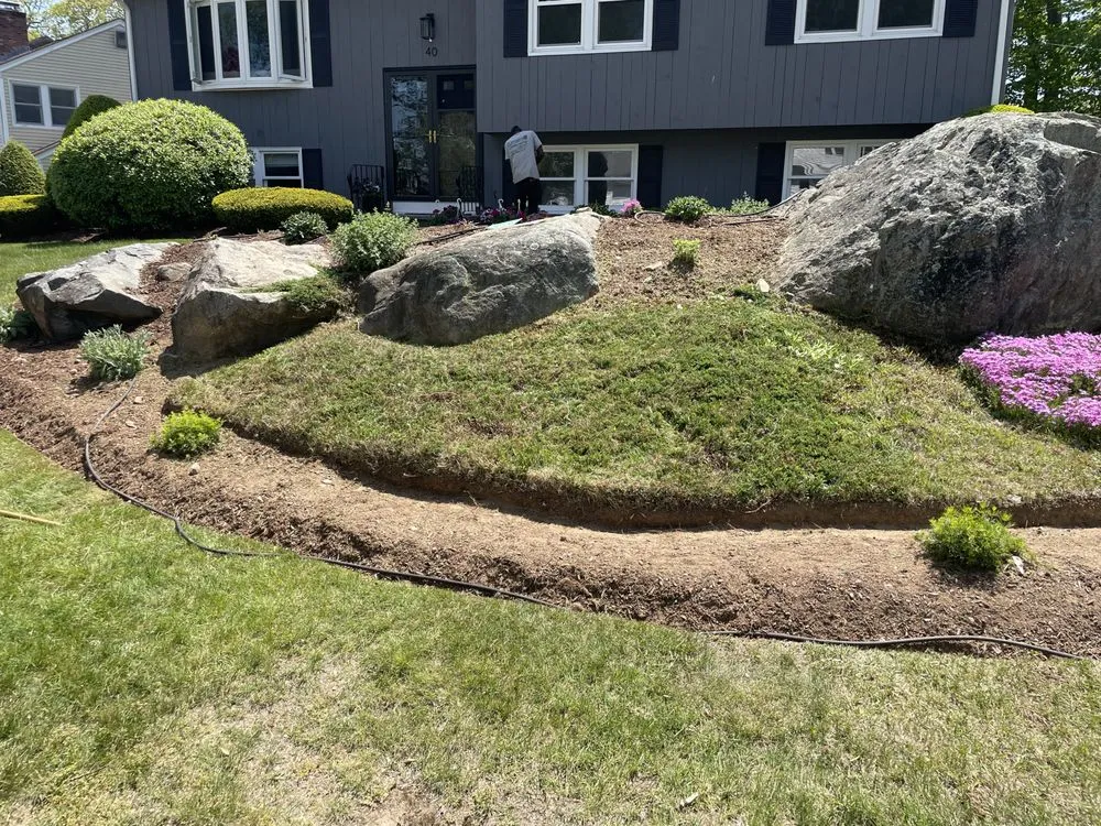 Reliable lawn mowing service with custom design across Randolph, MA - Clifford’s Landscaping