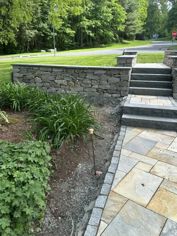 Professional yard cleanup service for residential properties in Middletown, CT by Cliffstone