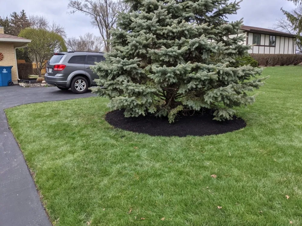 Custom garden landscaping with custom design in Miamisburg, OH by Clip Yer Tips Lawncare