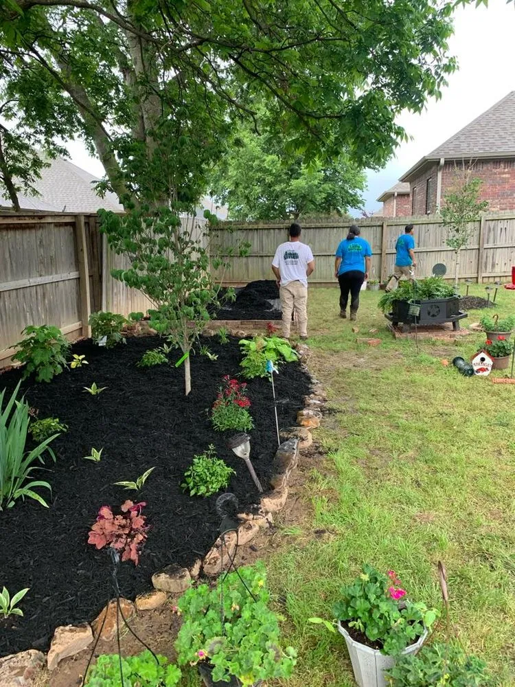 Custom landscape installation in Springdale, AR by CLJ Lawn Service