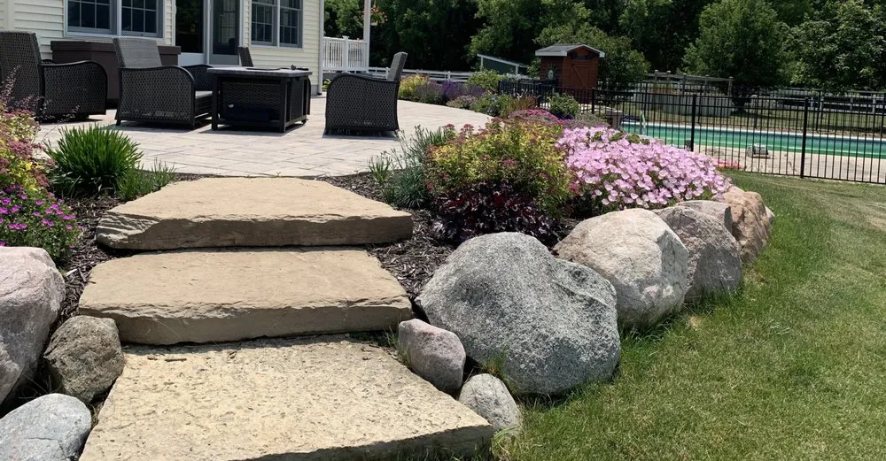 Reliable yard maintenance in East Lansing, MI by CLM Landscaping