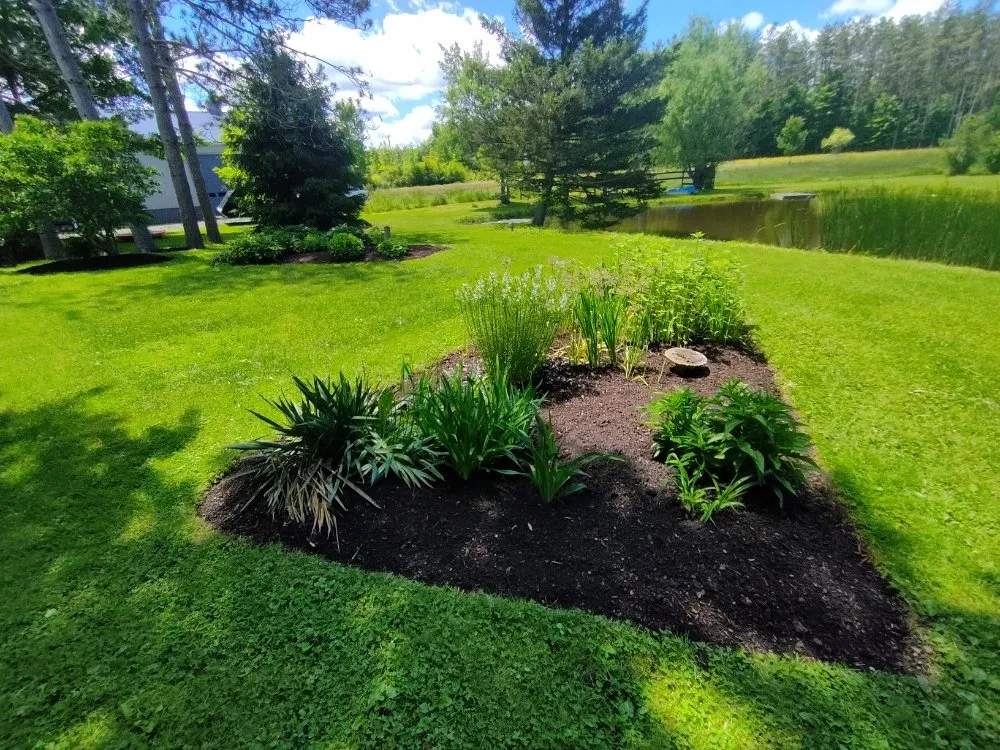 Professional garden landscaping with custom design across West Seneca, NY - Close Cuts Lawn Care
