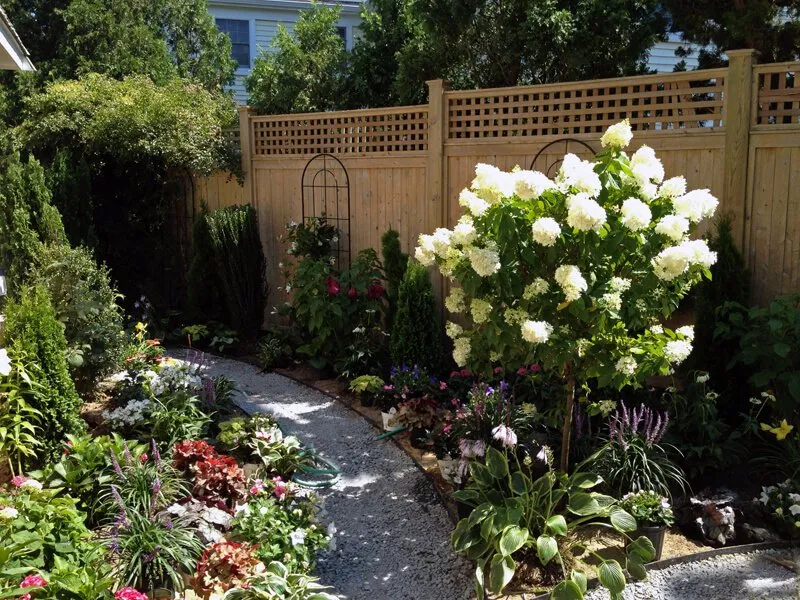 Custom yard maintenance for residential properties in Falmouth, MA by Clover Landscaping