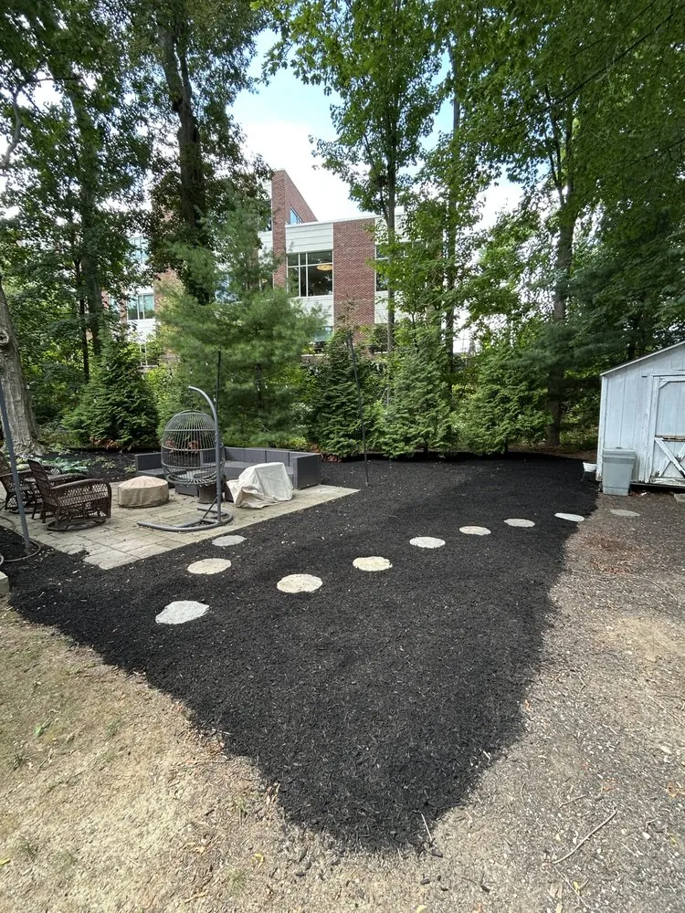 Affordable landscape installation for residential properties in Dover, MA by Clovers Lawn Care