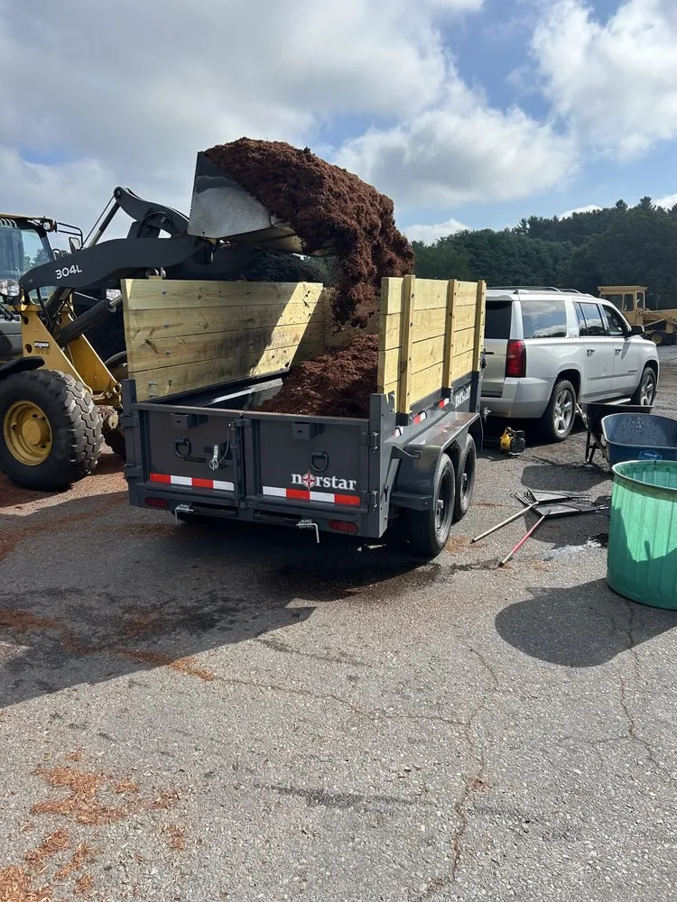 Professional landscape design for beautiful yards in Dover, MA by Clovers Lawn Care