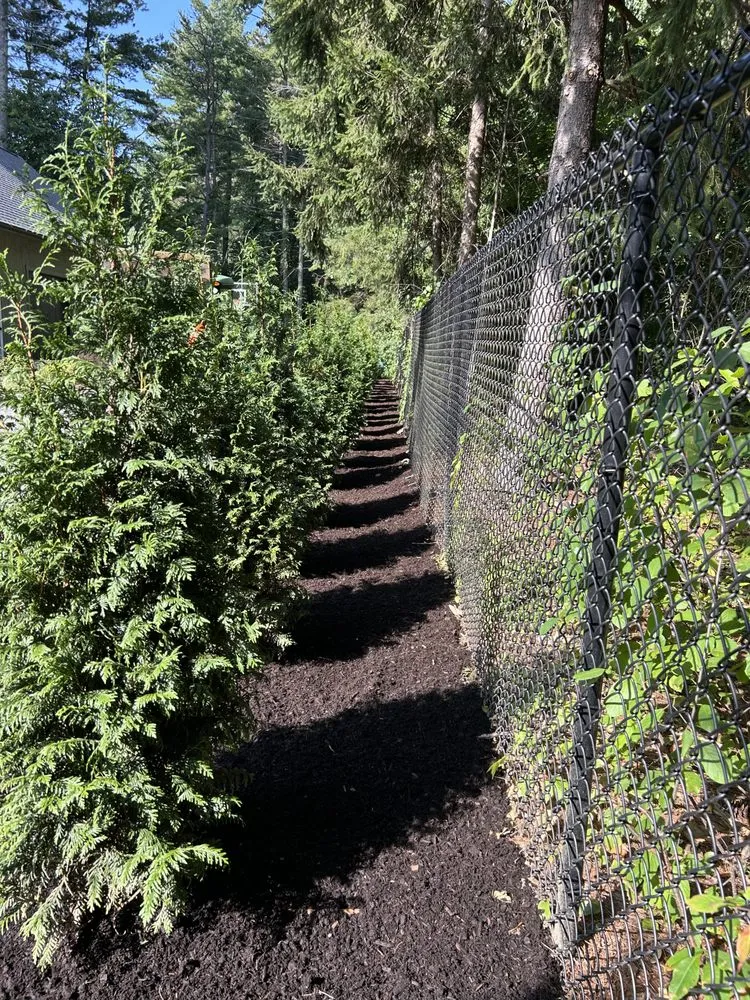 Custom outdoor landscaping with custom design across Dover, MA - Clovers Lawn Care