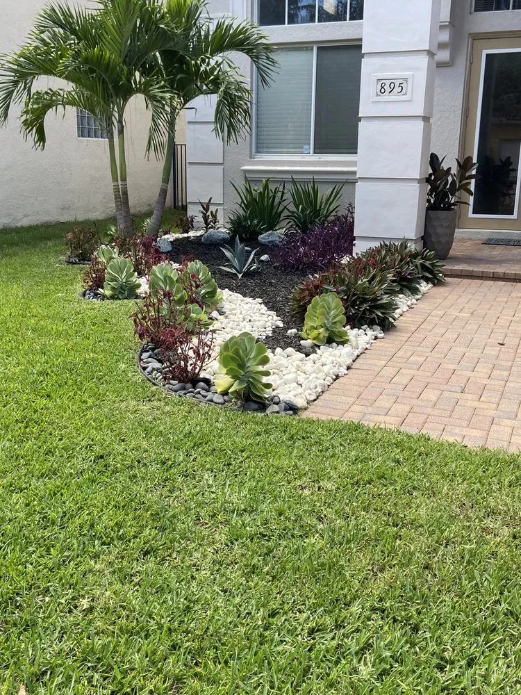 Professional residential landscaping with custom design in Lantana, FL by Clutch Solutions