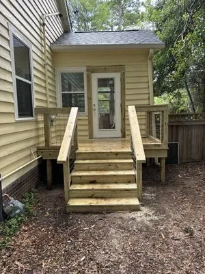 C&M Construction and Lawn Care Logo