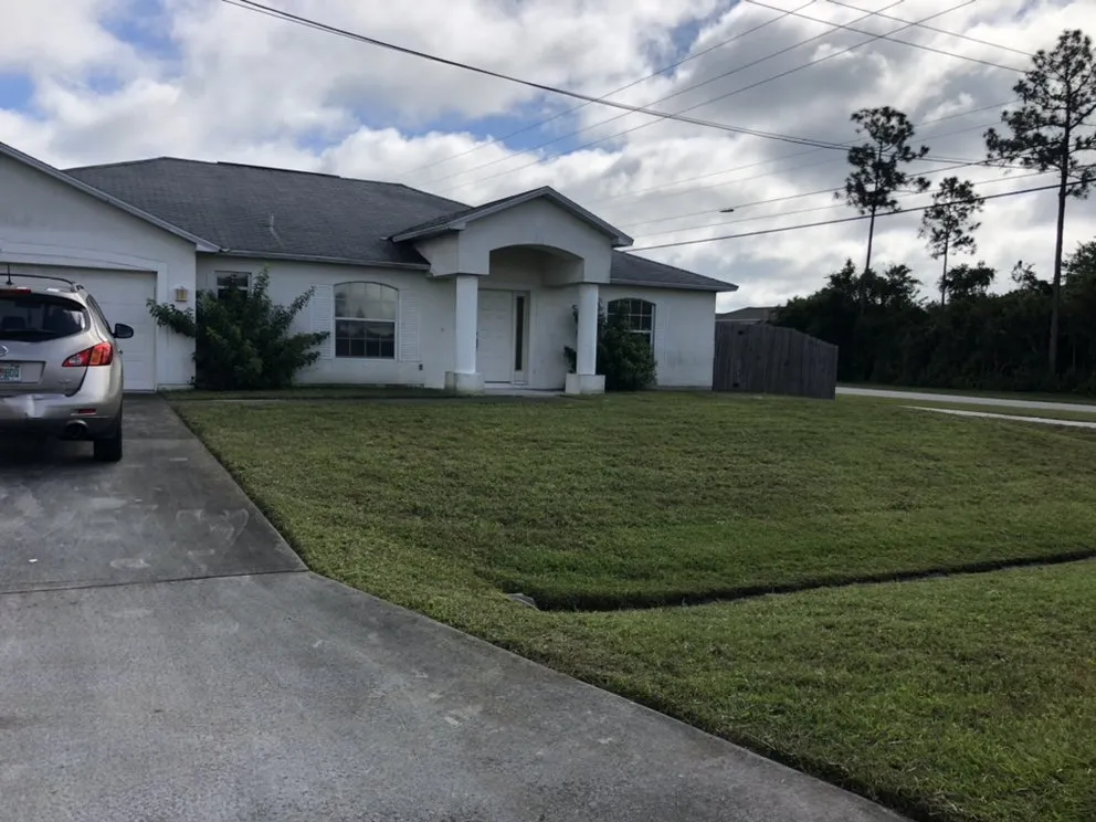 Professional lawn mowing service in Port St. Lucie, FL by CM Gatling Landscaping