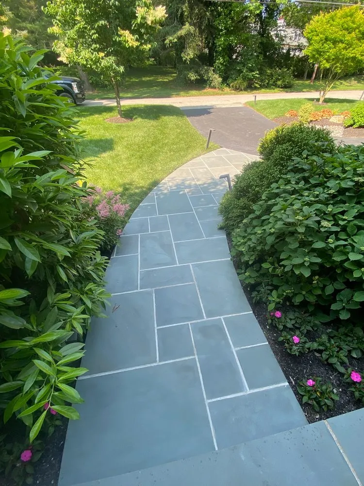 Custom lawn care service for year-round maintenance in Exton, PA by CM Jones