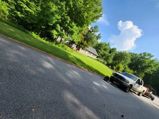 C&M Landscape Management Logo